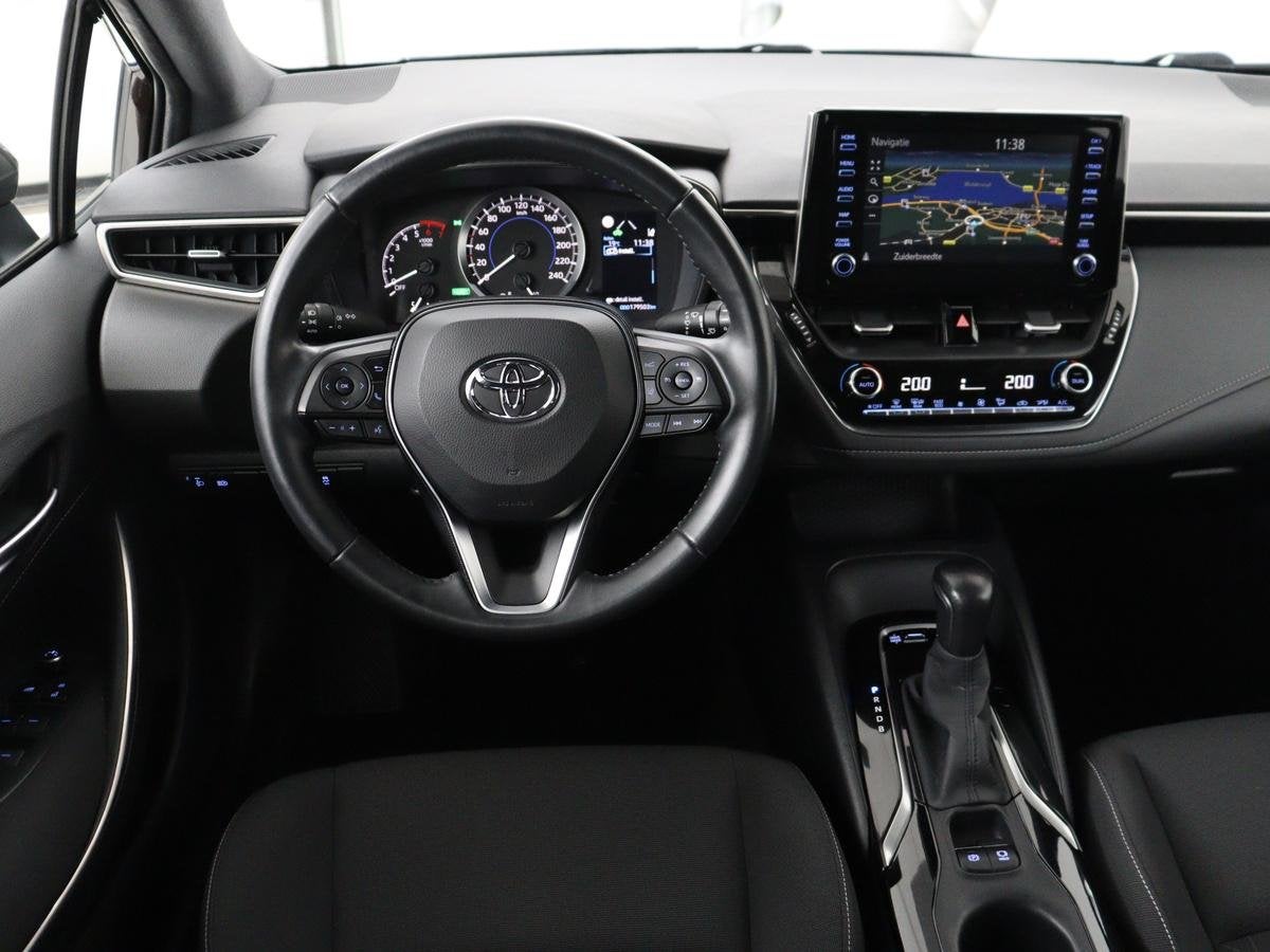 Toyota Corolla 1.8 Hybrid Active | 1e eigenaar | Carplay | A, Auto's, Gebruikt, 4 cilinders, Bruin, 122 pk
