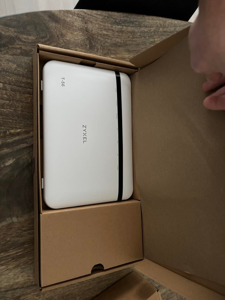 Zyxel T-56 Glasvezel Modem Router AX6000 2.5G Ethernet, Computers en Software, Routers en Modems, Ophalen of Verzenden, Nieuw