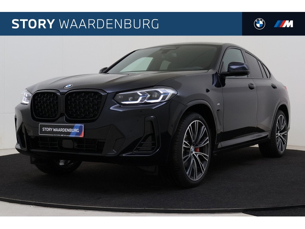 BMW X4 xDrive30i M Sport Automaat / Panoramadak / Trekhaak /, Auto's, BMW, 1998 cc, Zwart, 4 cilinders, Bedrijf