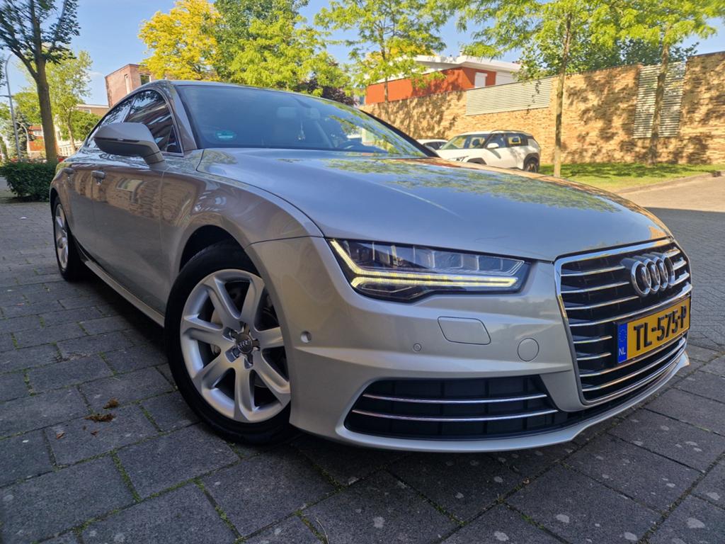 Audi A7 2.0 Tfsi 185KW Sportb.s-tron 2015 Geel ✅️org. Km, Auto's, Audi, 4 cilinders, 1984 cc, 4 stoelen, Geel
