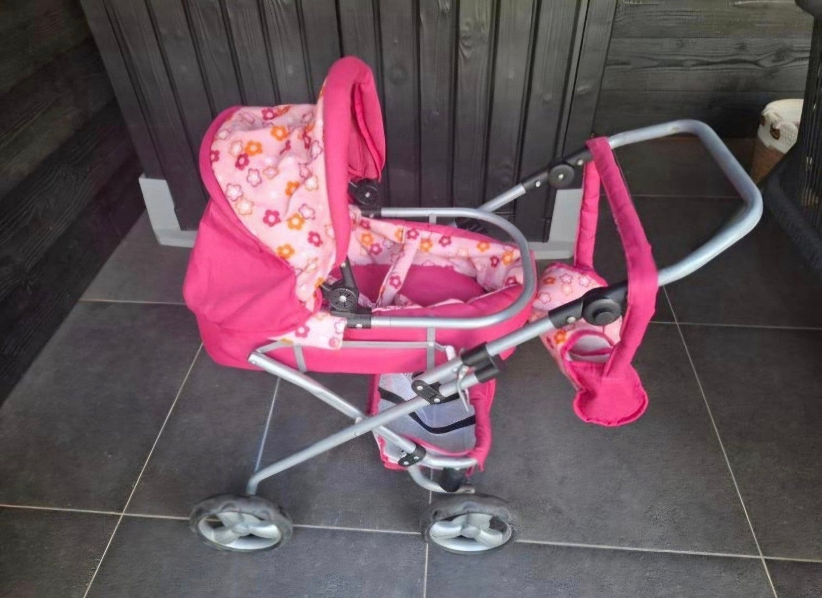 Roze poppen kinderwagen met bloemetjespatroon, Ophalen of Verzenden, Gebruikt, Kinderwagen, Overige merken