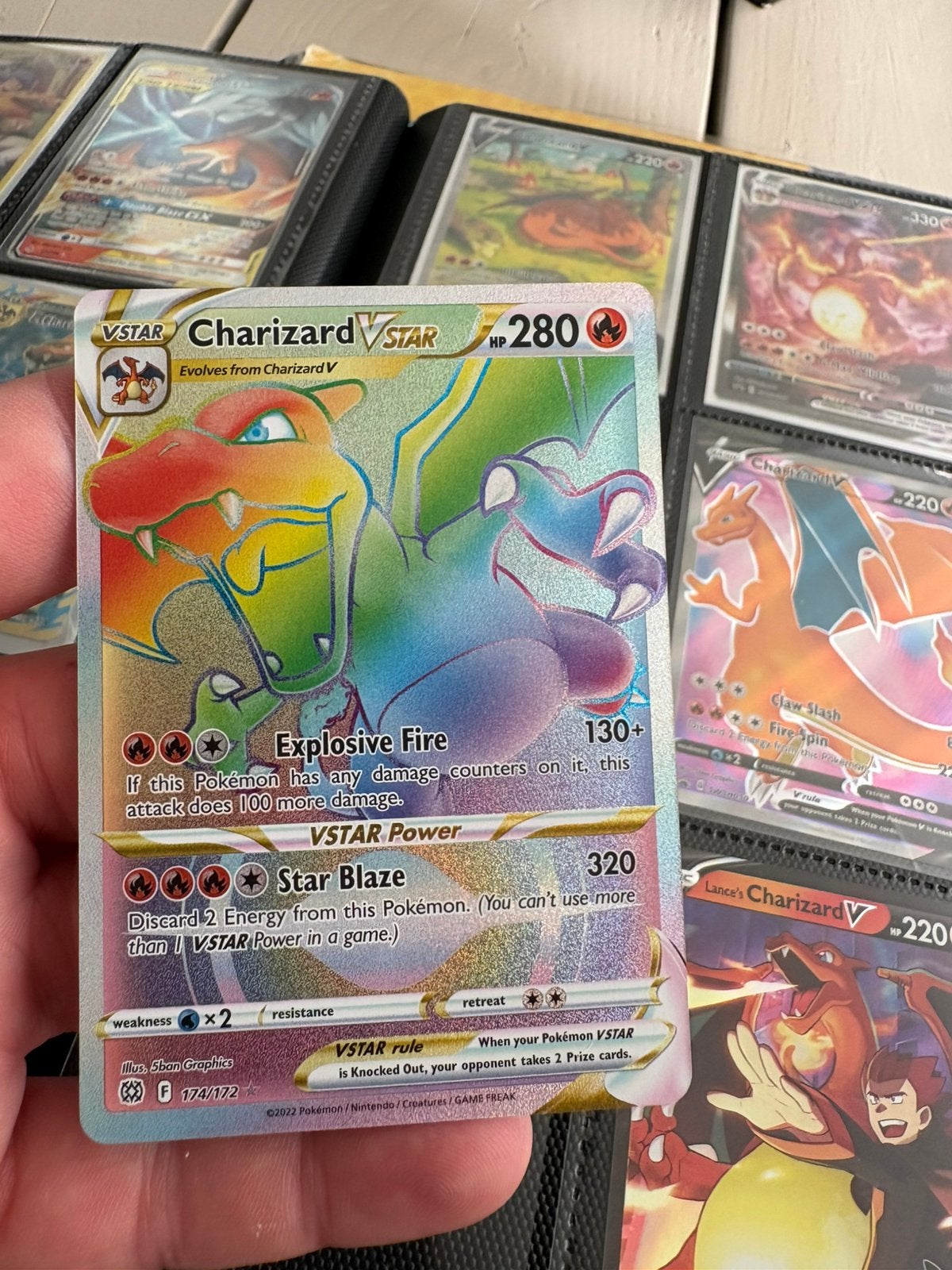 Charizard vstar rainbow, Ophalen of Verzenden, Zo goed als nieuw, Meerdere kaarten, Foil