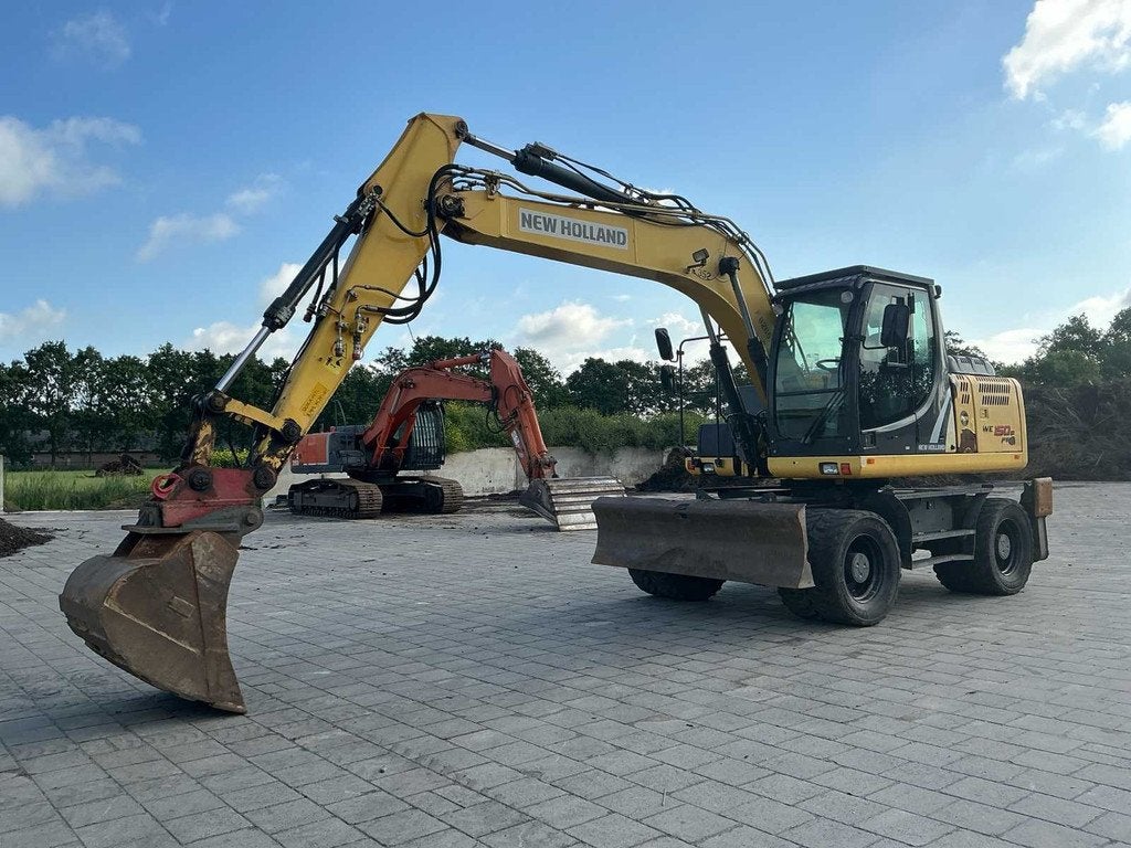 2014 New Holland WE150B Pro Banden graafmachine, Graafmachine