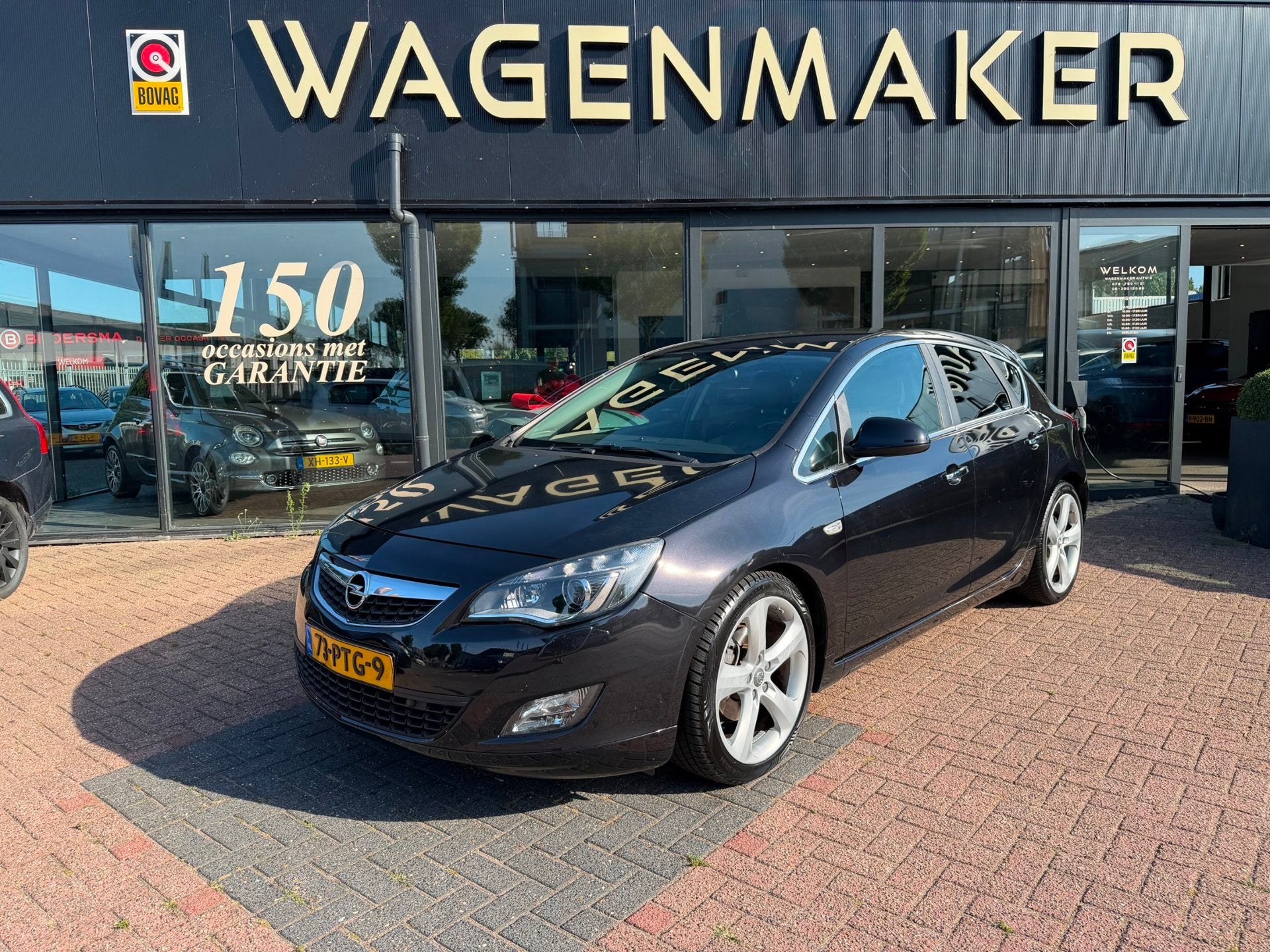 Opel Astra 1.6 Turbo Sport AUT|Leder|NAVI|Cruise|Trekhaak, Auto's, 730 kg, Gebruikt, 4 cilinders, Zwart