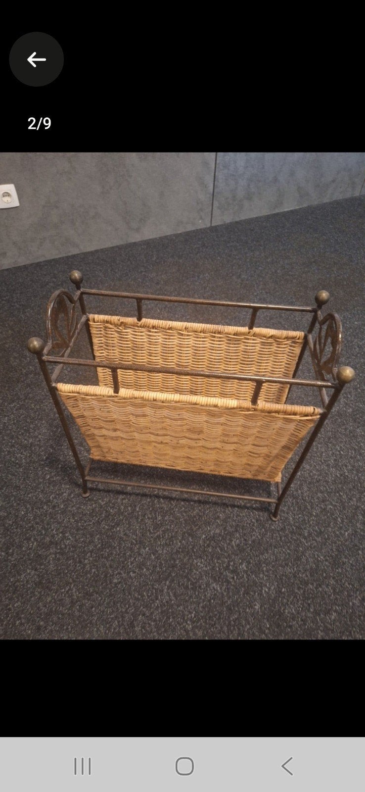 krantenbak van metaal en rotan, Ophalen