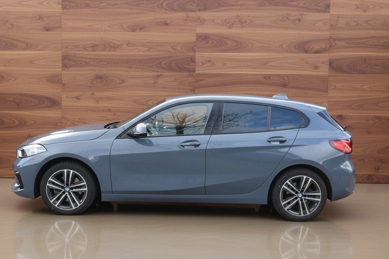 BMW 1-serie 118i High Executive SPORTLINE | SPORTLEDER | TRE, Dealer onderhouden, Gebruikt, Met garantie (alle), Bedrijf