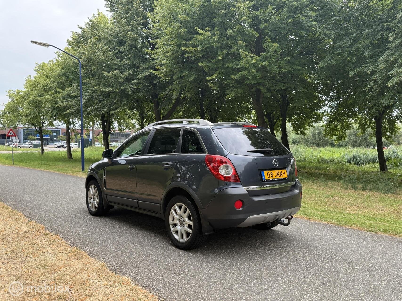 Opel Antara 2.4-16V Temptation*4WD*NAVI*TREKHAAK*CRUISE*AIRC, Auto's, Stof, Gebruikt, Zwart, 4 cilinders