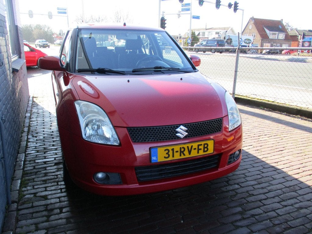 Suzuki Swift 1.3 Exclusive, Auto's, Suzuki, Voorwielaandrijving, Stof, Zwart, 965 kg