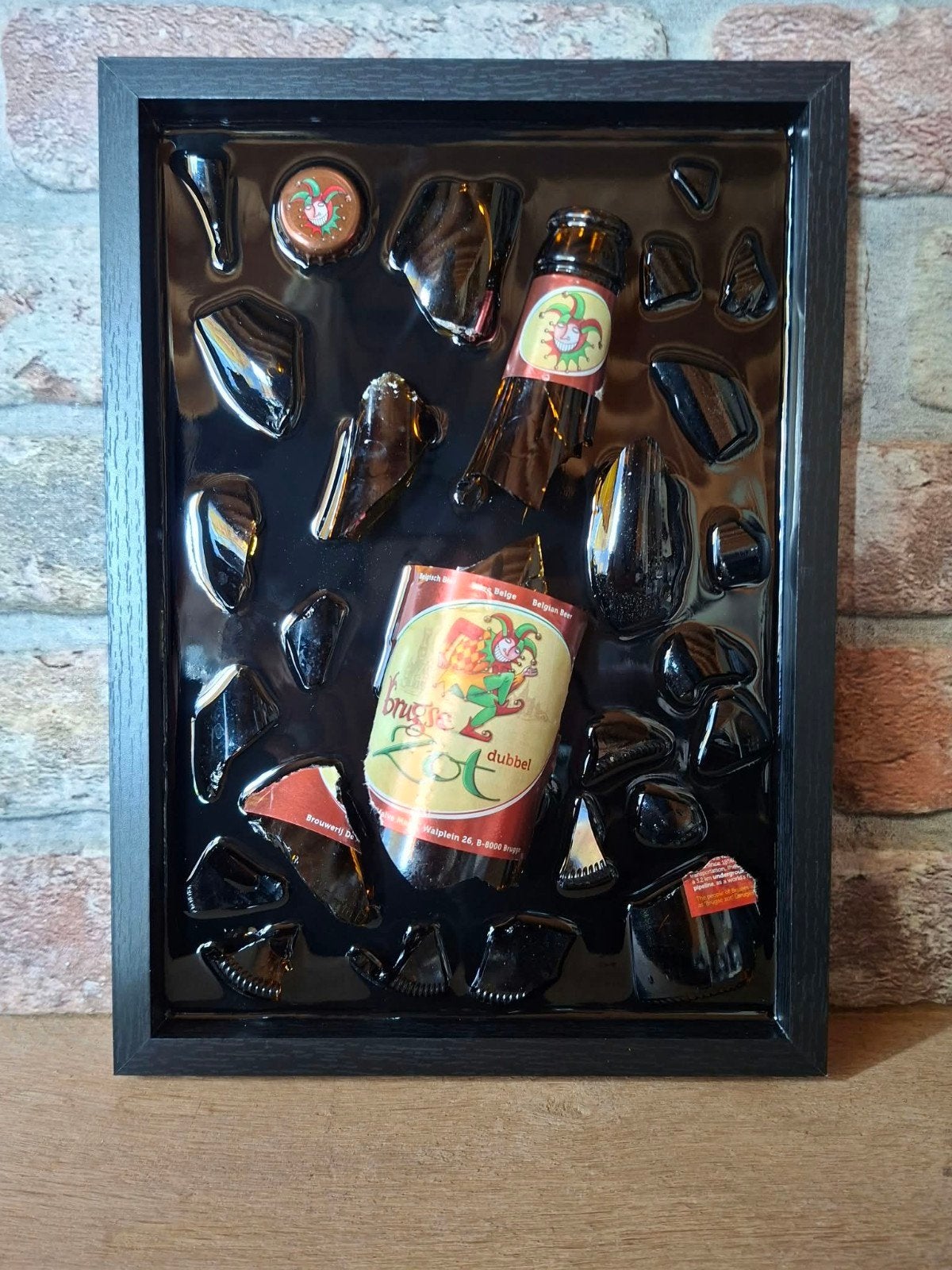 Brugse Zot flesje verwerkt in een lijst 23x33 met Epoxy, Ophalen of Verzenden