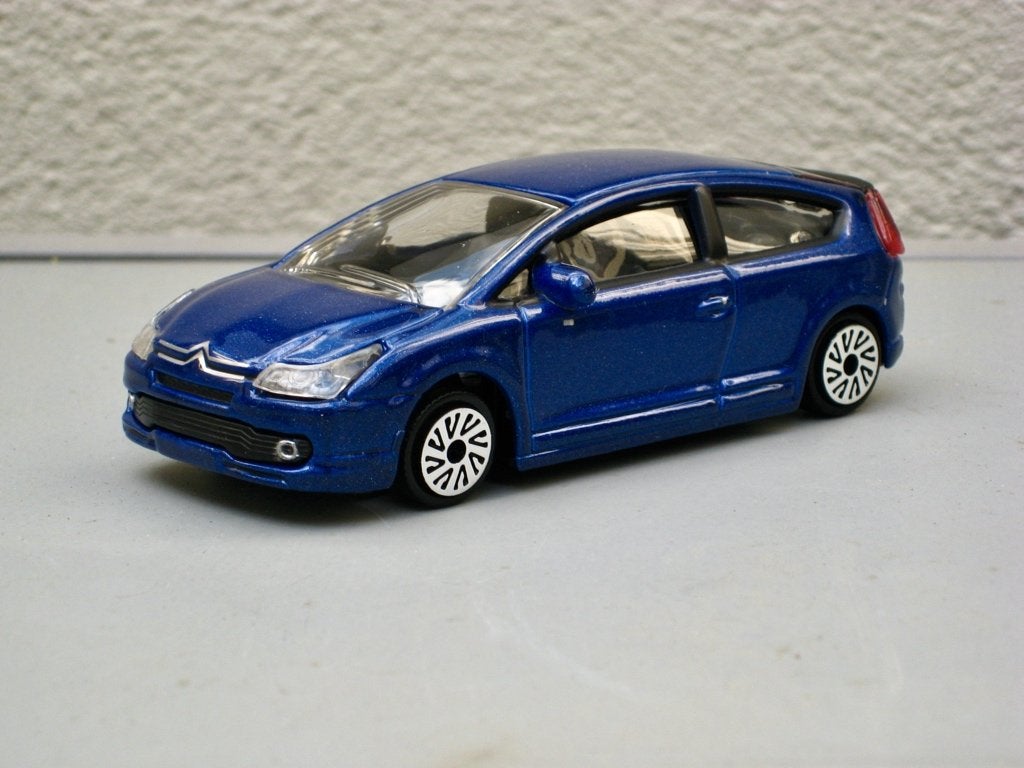Citroen C4 coupé Burago 1:43, Ophalen of Verzenden, Nieuw, Auto, Norev