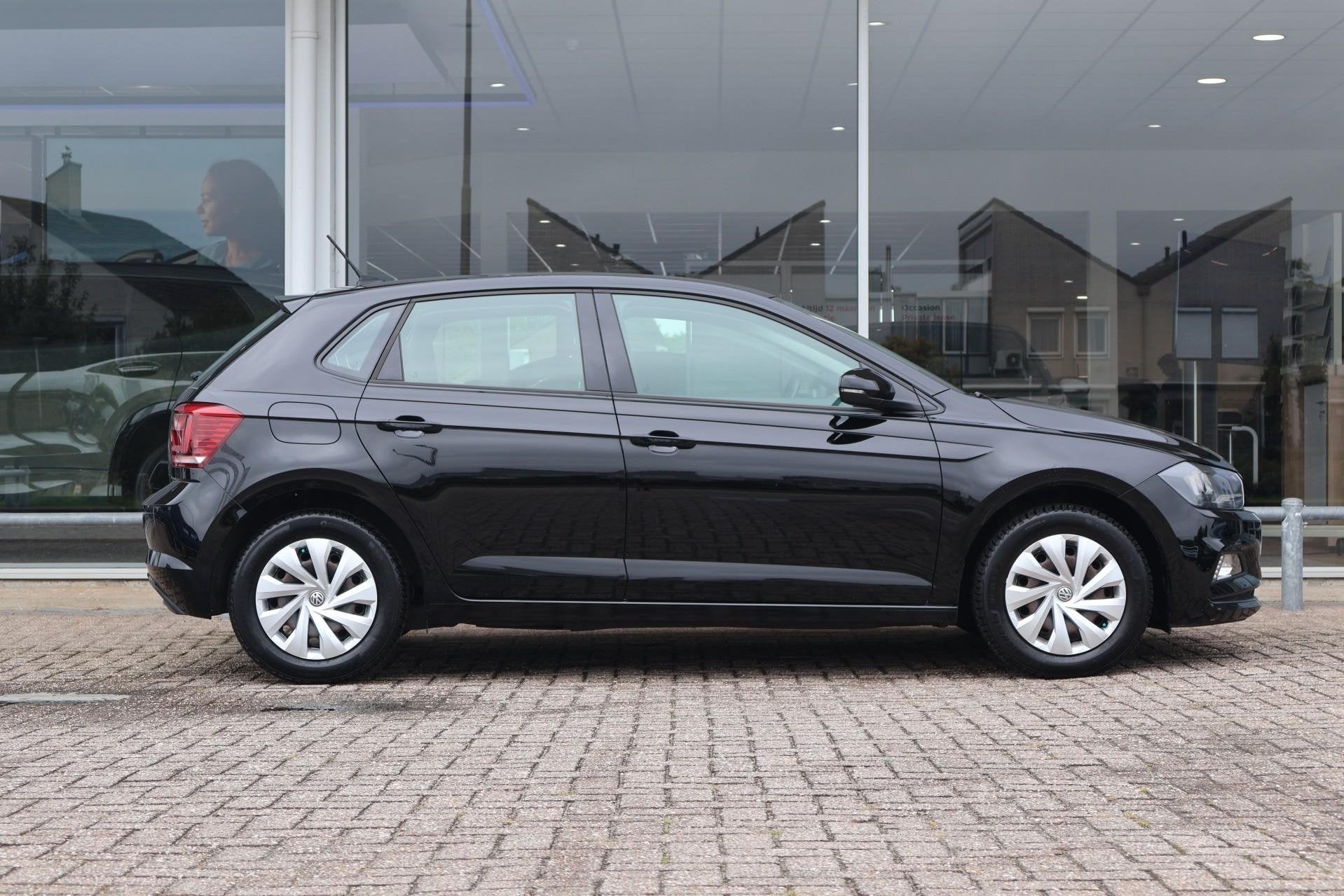 Volkswagen Polo 1.0 TSI 95pk Comfortline | Navigatie | Carpl, Auto's, Voorwielaandrijving, 12 maanden, Stof, Zwart