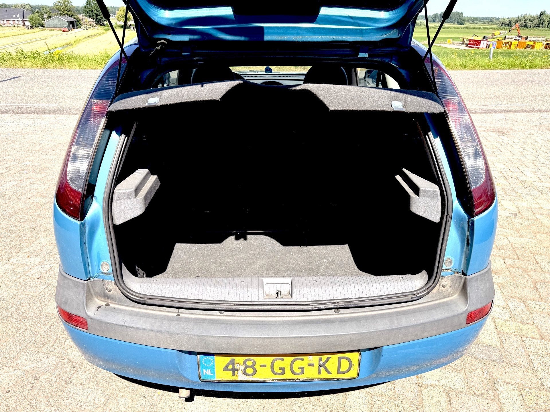 Foto 9 van Opel Corsa 1.0-12V Comfort LAGE KM's 156346 NAP auto is rijb