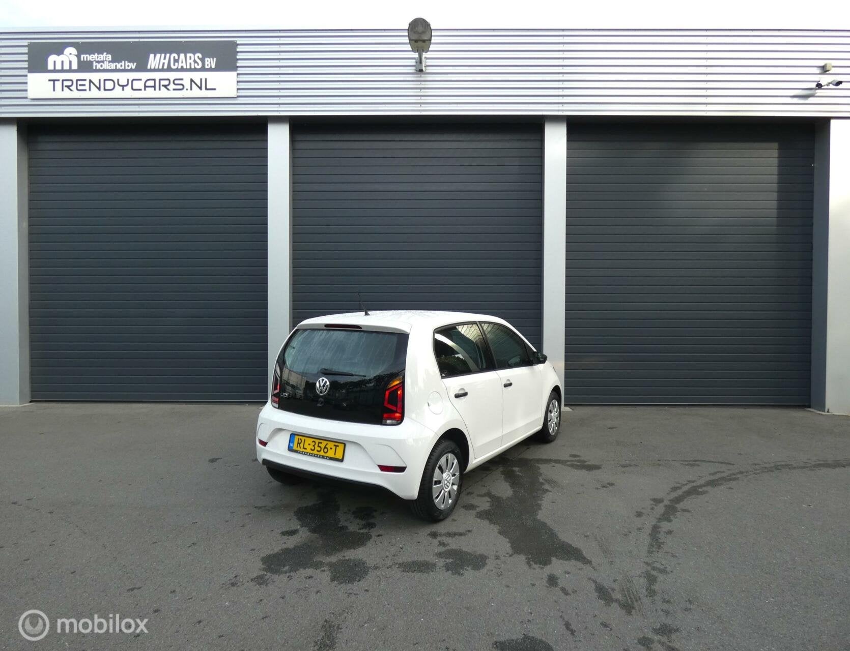 Volkswagen Up! 1.0 BMT take up!, Auto's, Voorwielaandrijving, Gebruikt, Wit, Origineel Nederlands