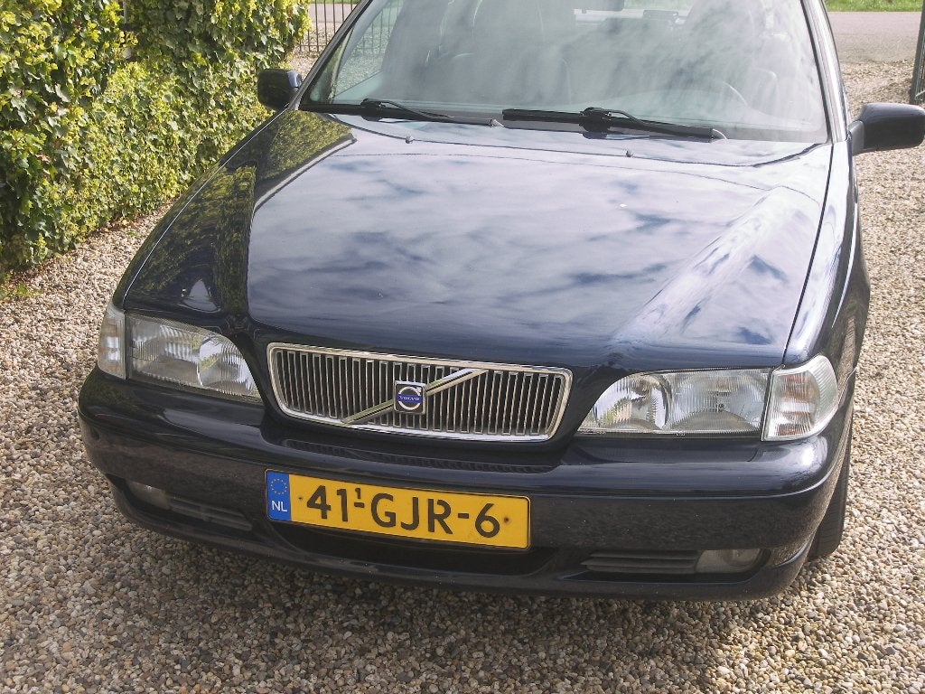 Volvo V70 2.4 140PK AUT 1999 Blauw, Auto's, Zwart, Blauw, Leder en Stof, Stoelverwarming