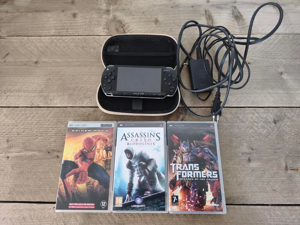 Psp 1000, Spelcomputers en Games, Spelcomputers | Sony PSP, Gebruikt, PSP, Zwart, Met games, Met UMD-films, Ophalen of Verzenden