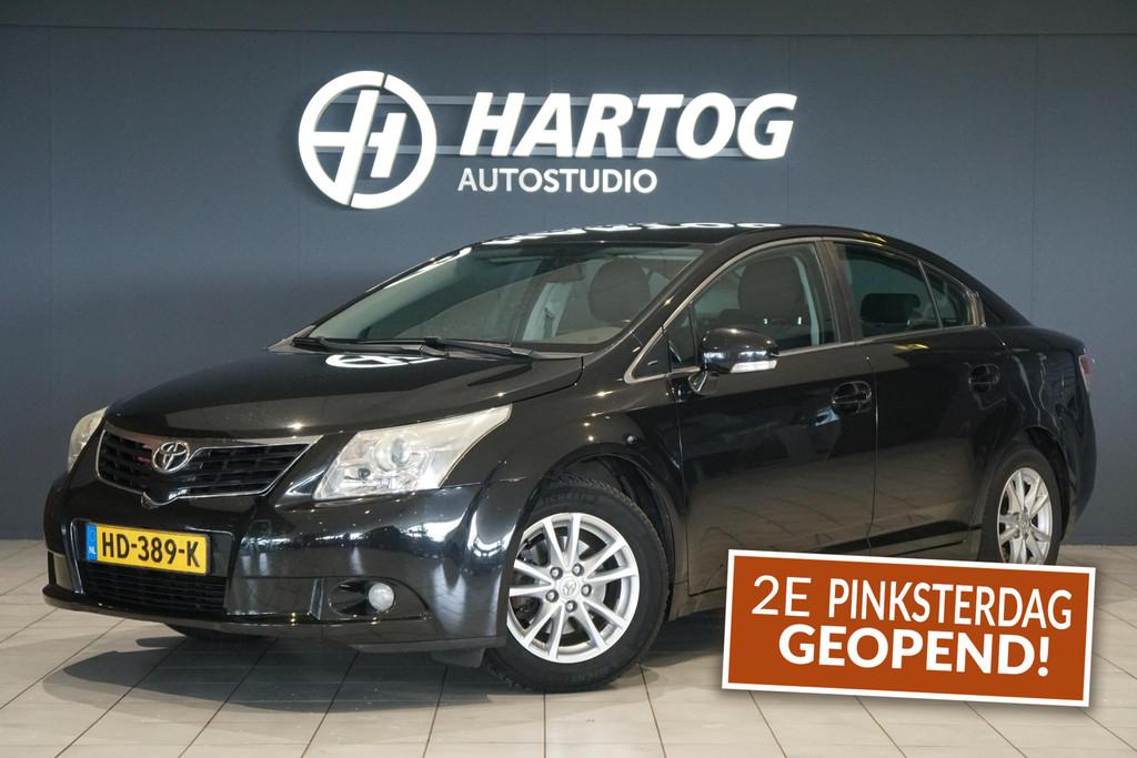 Toyota Avensis 1.8 VVTi Business + CAMERA / TREKHAAK, Auto's, Voorwielaandrijving, Euro 5, Zwart, Bedrijf