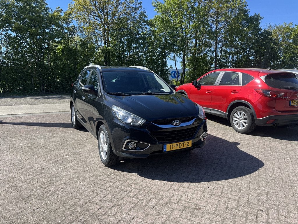 Hyundai ix35 2.0i Style TREKHAAK CLIMA (bj 2011), Gebruikt, Zwart, 4 cilinders, Leder en Stof