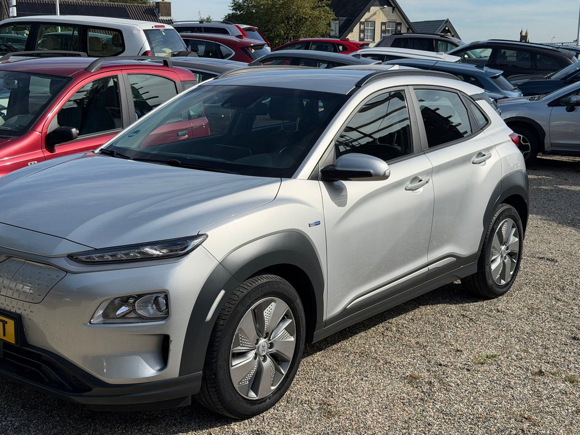 Hyundai Kona EV Comfort 64 kWh 99,1% SOH 1e Eig Dealer Onder, Auto's, Dealer onderhouden, Stof, Gebruikt, 174 min