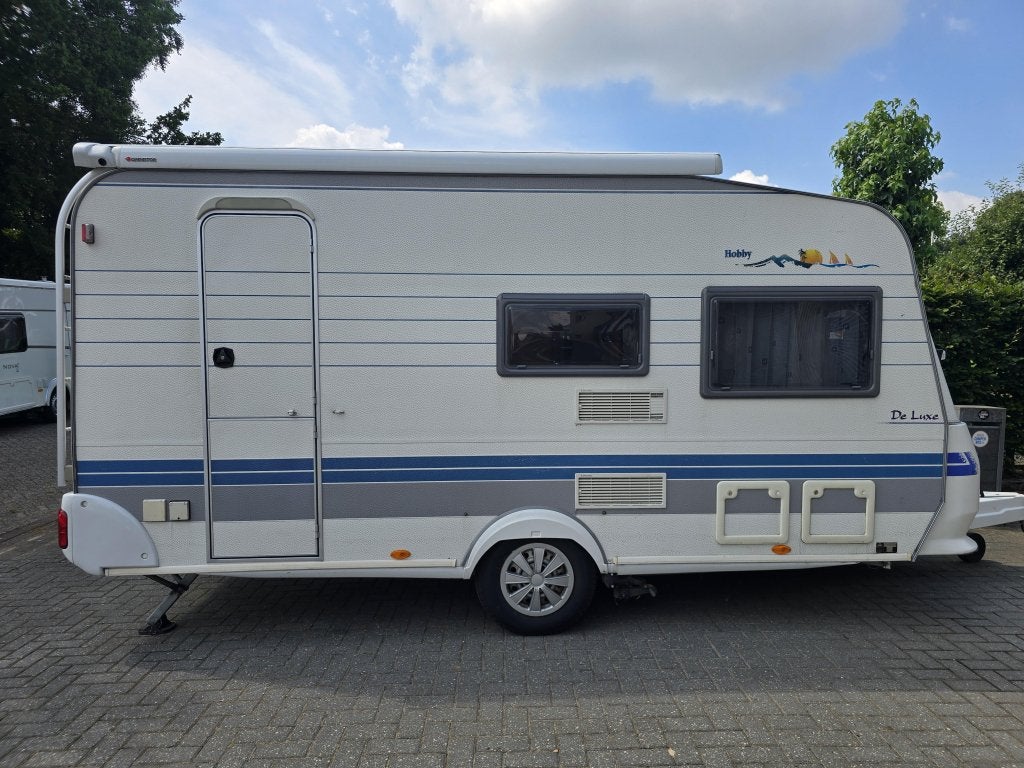 Hobby De luxe Easy 440 SF met mover + 4 persoons, Caravans en Kamperen, Schokbreker, Hobby, Bedrijf, Treinzit
