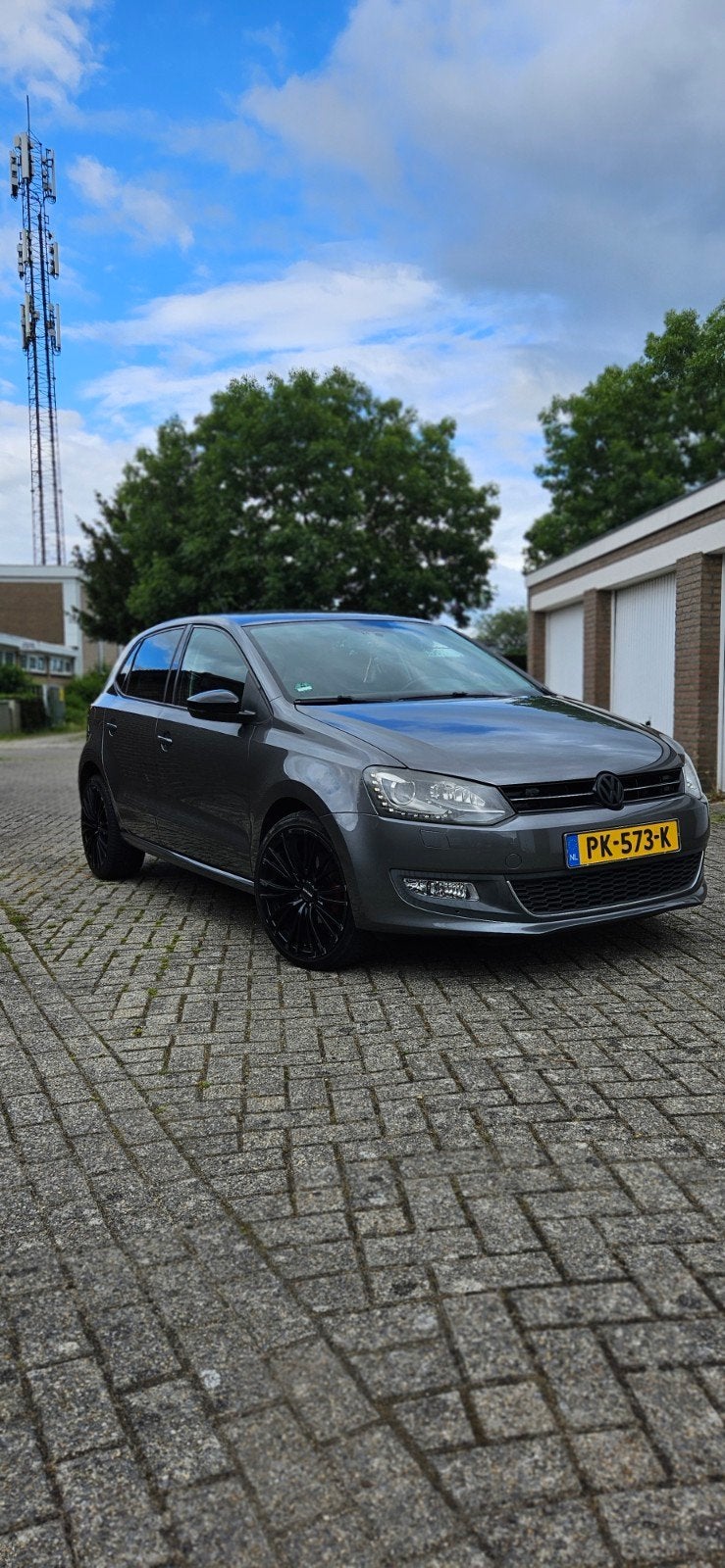 Volkswagen Polo 1.2 TSI 77KW DSG 2012 Grijs, Auto's, Stof, 40 €/maand, Zwart, 1200 kg