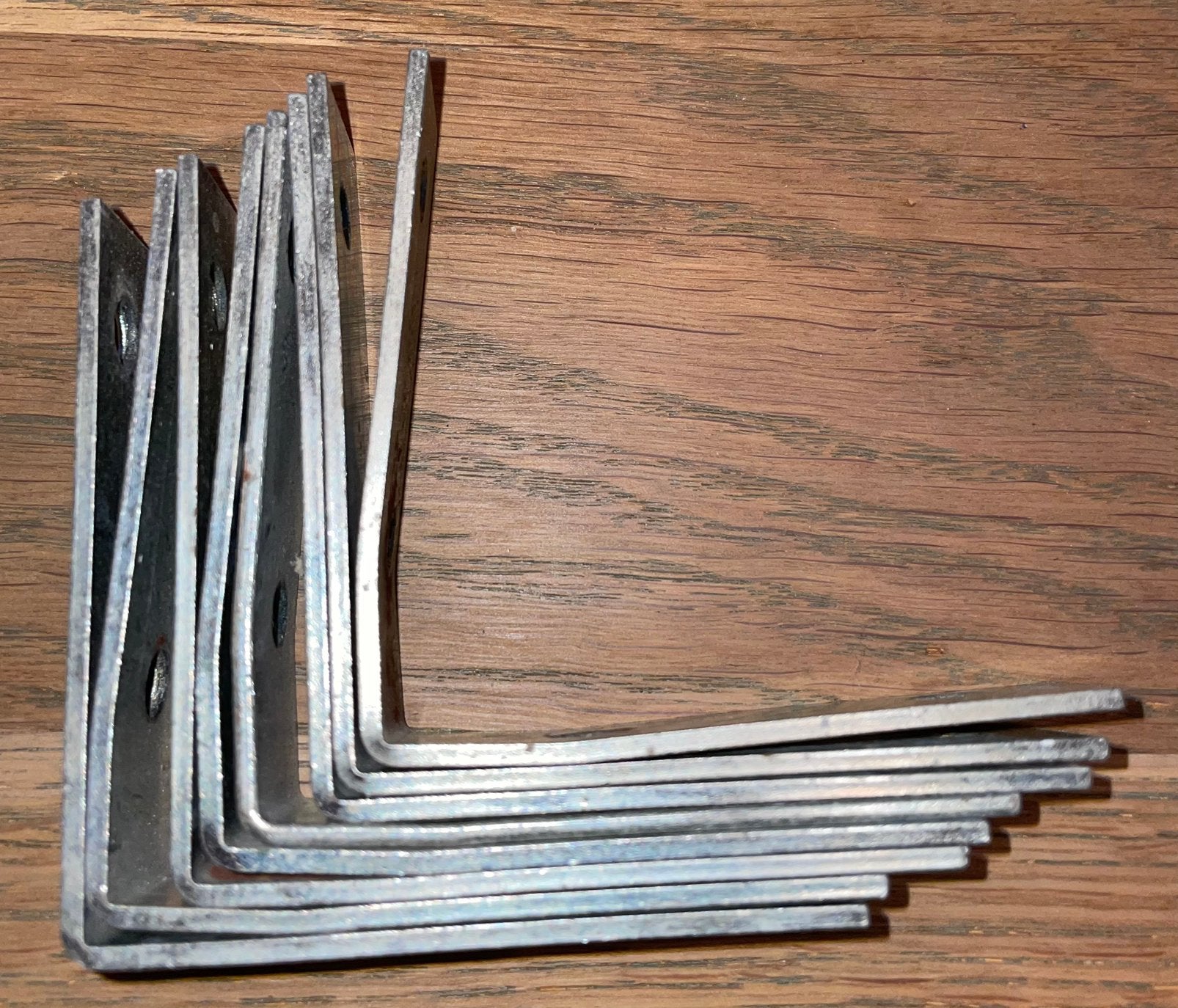 8 metalen hoekbeugels hoekankers 7cm metaal 4 gats 5 euro, Ophalen of Verzenden, Zo goed als nieuw