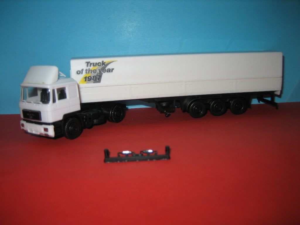 MAN  Truck of the Year  met oplegger  Herpa, Ophalen of Verzenden, Zo goed als nieuw, Bus of Vrachtwagen, Herpa