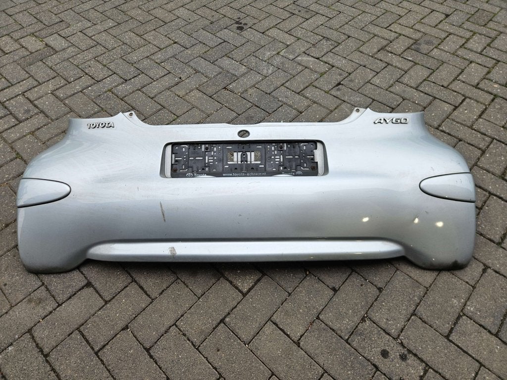 ACHTERBUMPER TOYOTA AYGO GRIJS, Niet ingevuld, Gebruikt, Niet ingevuld, Ophalen of Verzenden