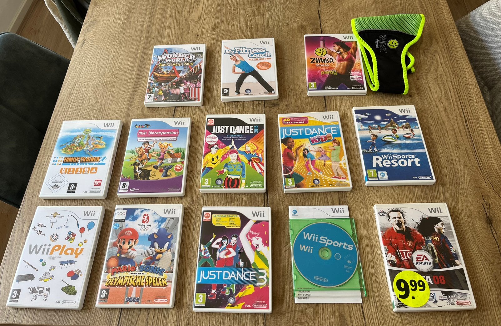 Nintendo Wii bundel: spellen + mat & Zumba belt, Spelcomputers en Games, Games | Nintendo Wii, Verzenden, Zo goed als nieuw, Sport