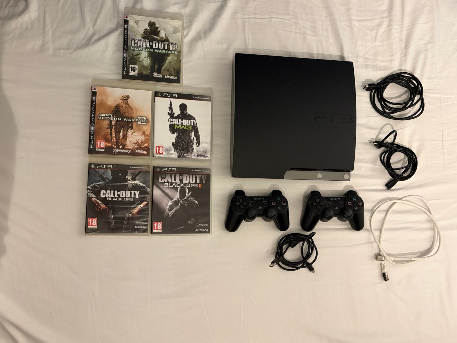 Playstation 3 slim + controllers + games, Ophalen, Met games, Met 2 controllers, Zo goed als nieuw