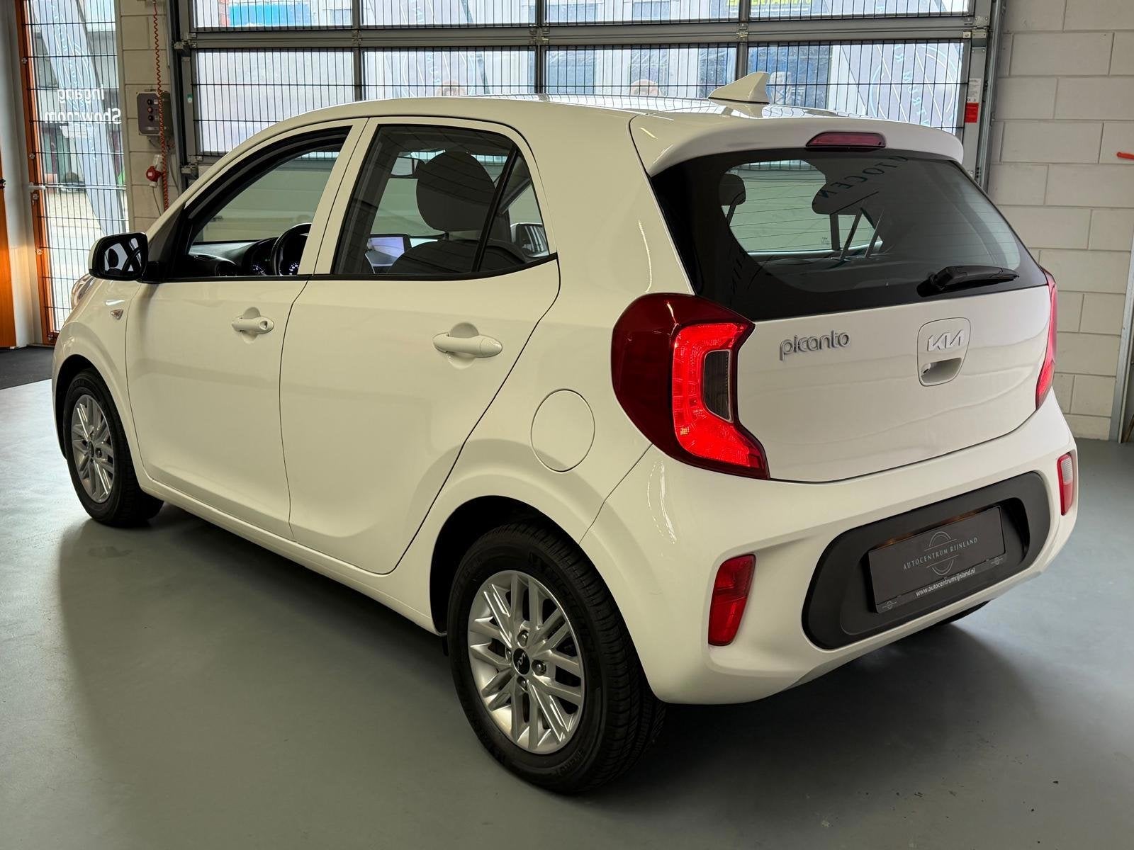 Kia Picanto 1.0 DPi DynamicLine, Camera, Carplay, Airco, Voorwielaandrijving, Stof, 4 stoelen, Wit
