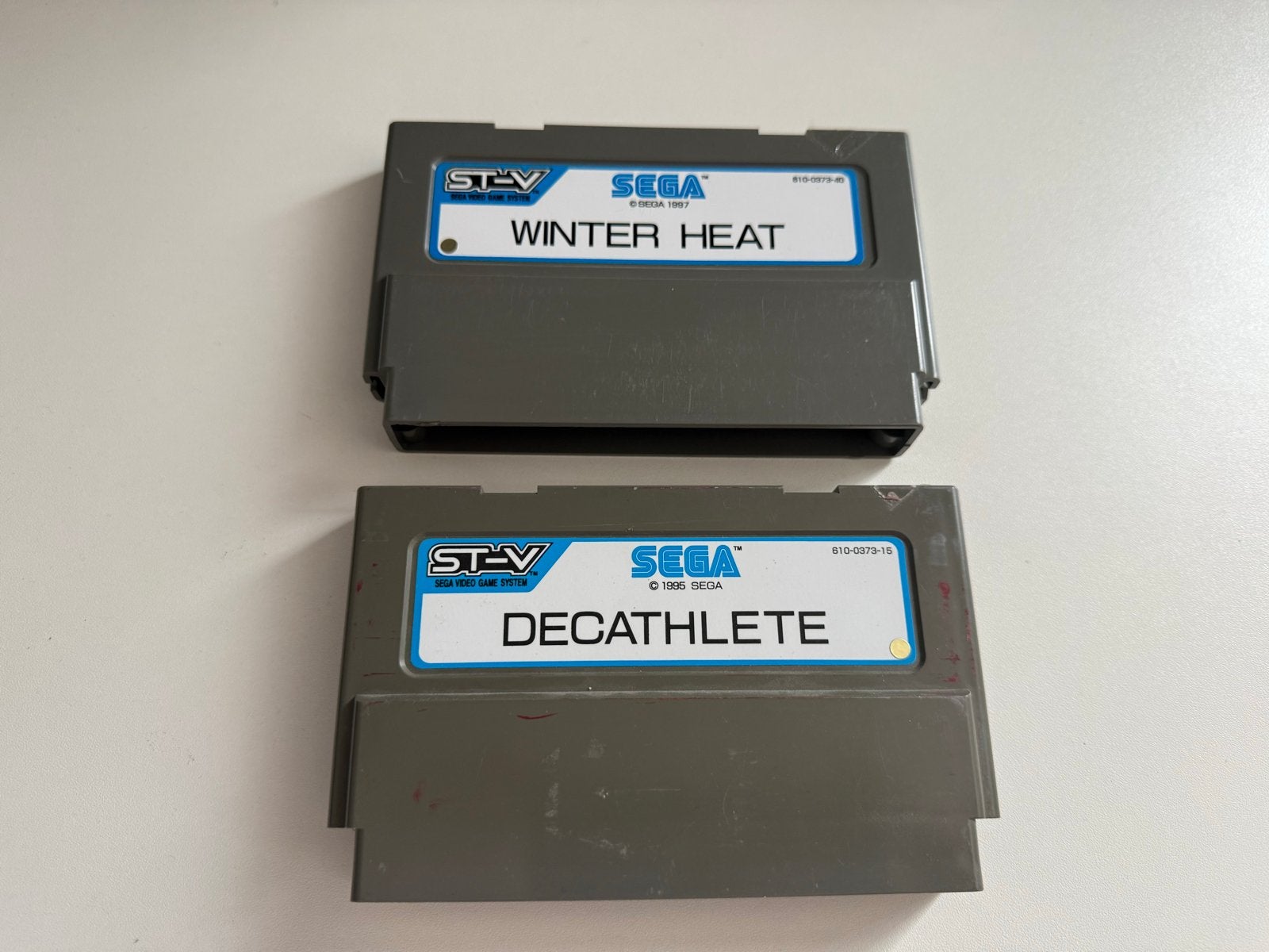 Sega ST-V Cartridges: Winter Heat & Decathlete, Gebruikt, 2 spelers, Ophalen of Verzenden, Overige modellen