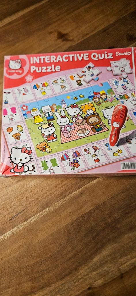 interactieve Quiz puzzel Hello kitty, Ophalen of Verzenden, 10 tot 50 stukjes, Gebruikt