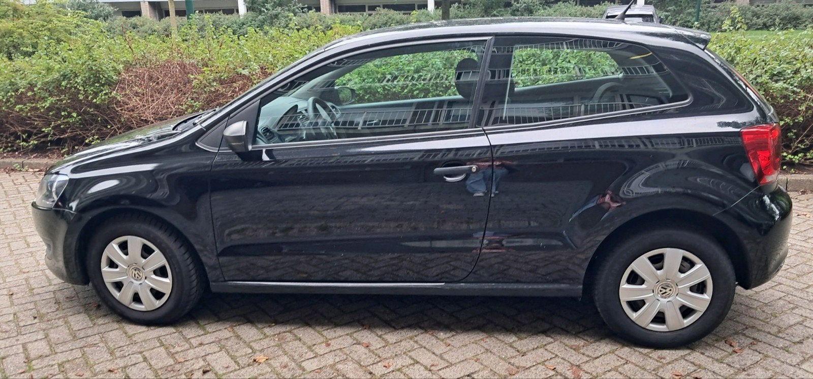 Foto 8 van Volkswagen Polo 1.2 uit 2012 Zwart, 169.193 KM, Airco