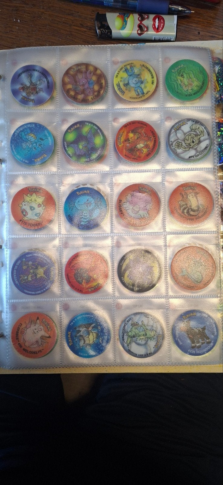 Leuke verzameling Pokémon Flippo's in map, Ophalen, Verzameling, Met verzamelmap(pen)