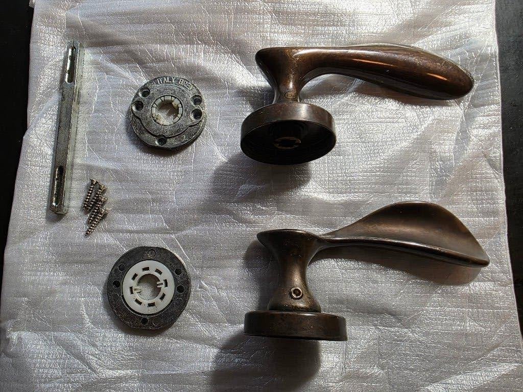 Bronskleurige klink voor buitendeur, Ophalen of Verzenden, Gebruikt, Overige materialen, Klink of Kruk