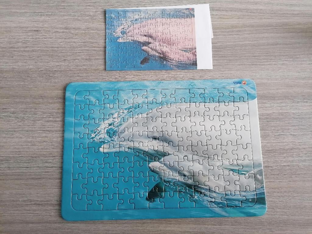 Dolfijnen kinderpuzzel 96 stukjes met onderplaat, Ophalen of Verzenden, Meer dan 50 stukjes, Gebruikt, 6 jaar of ouder