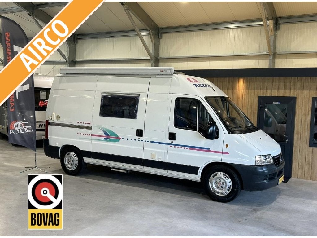 Adria Twin 560 AIRCO/Zonnepaneel 2003 FIAT DUCATO 128PK, Caravans en Kamperen, Ringverwarming, Fiat, Tot en met 2, Treinzit