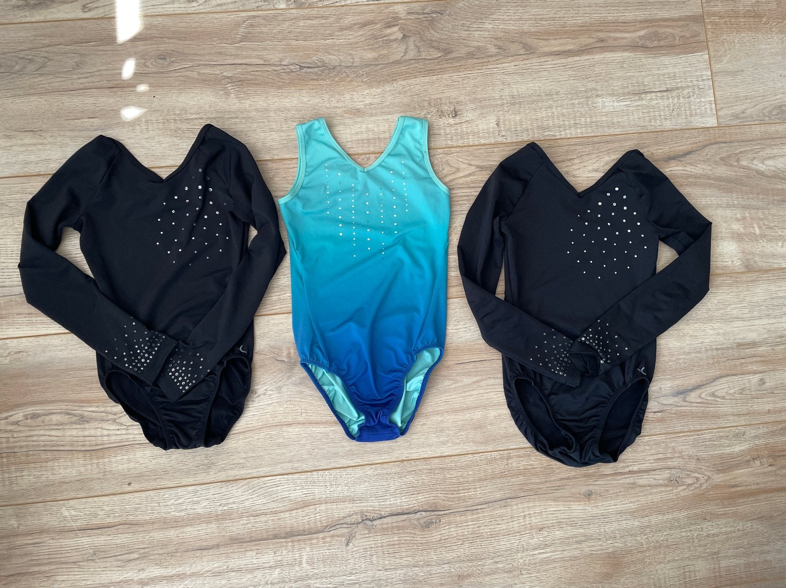 Turnpakjes voor 7 en 8 jaar - Zwart en Blauw/Turquoise, Gebruikt, Zwart, Turnpak(je), Kindermaat 122 t/m 140