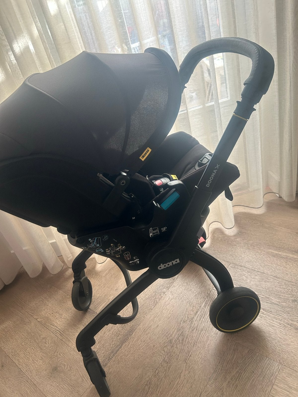 Doona X autostoel en kinderwagen in één - Gebruikt, Autogordel of Isofix, Gebruikt, Slaapstand, 0 t/m 13 kg