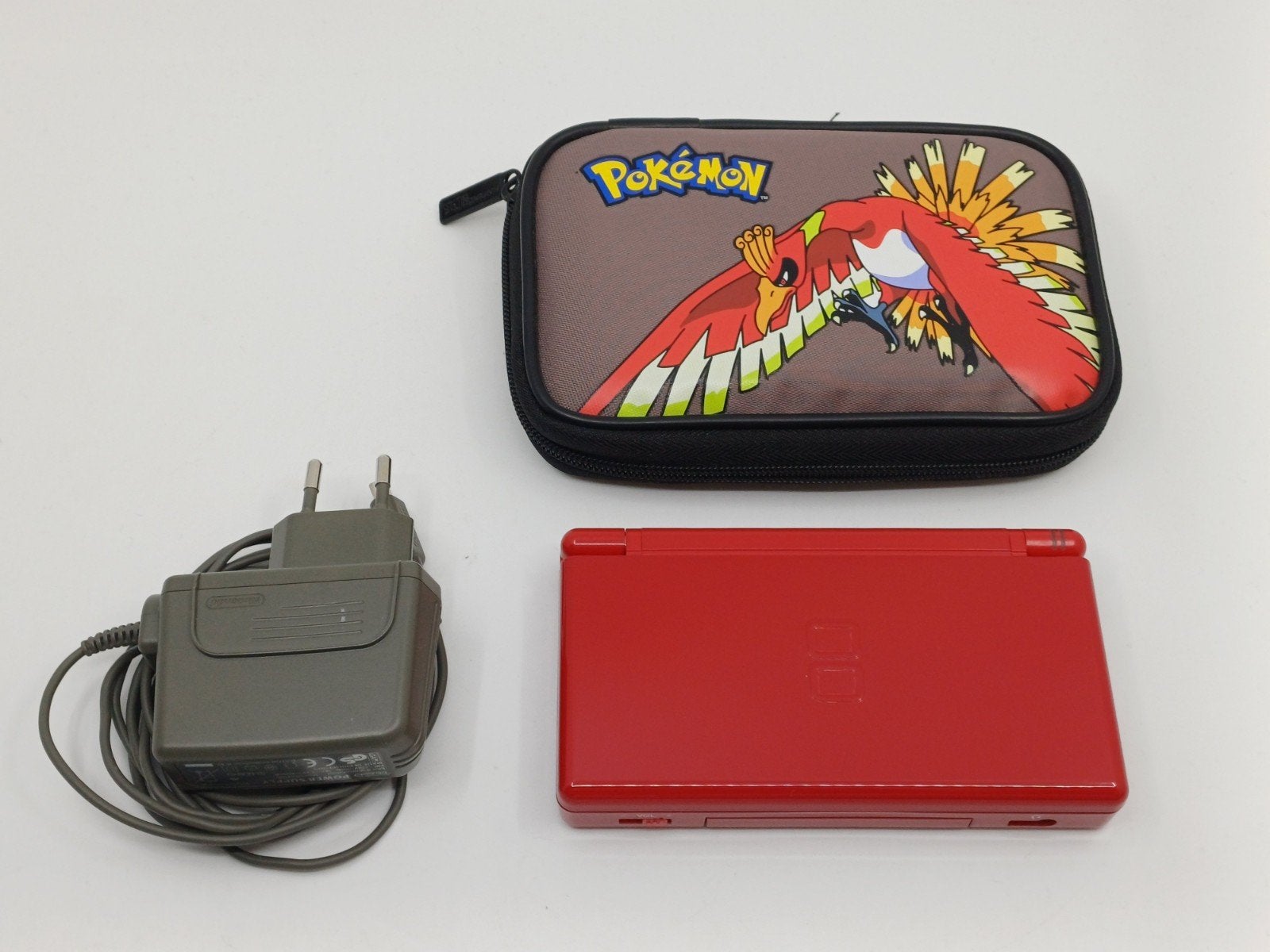 Rode Nintendo DS Lite met Pokémon hoesje en oplader, Spelcomputers en Games, Gebruikt, Verzenden, DS Lite, Rood