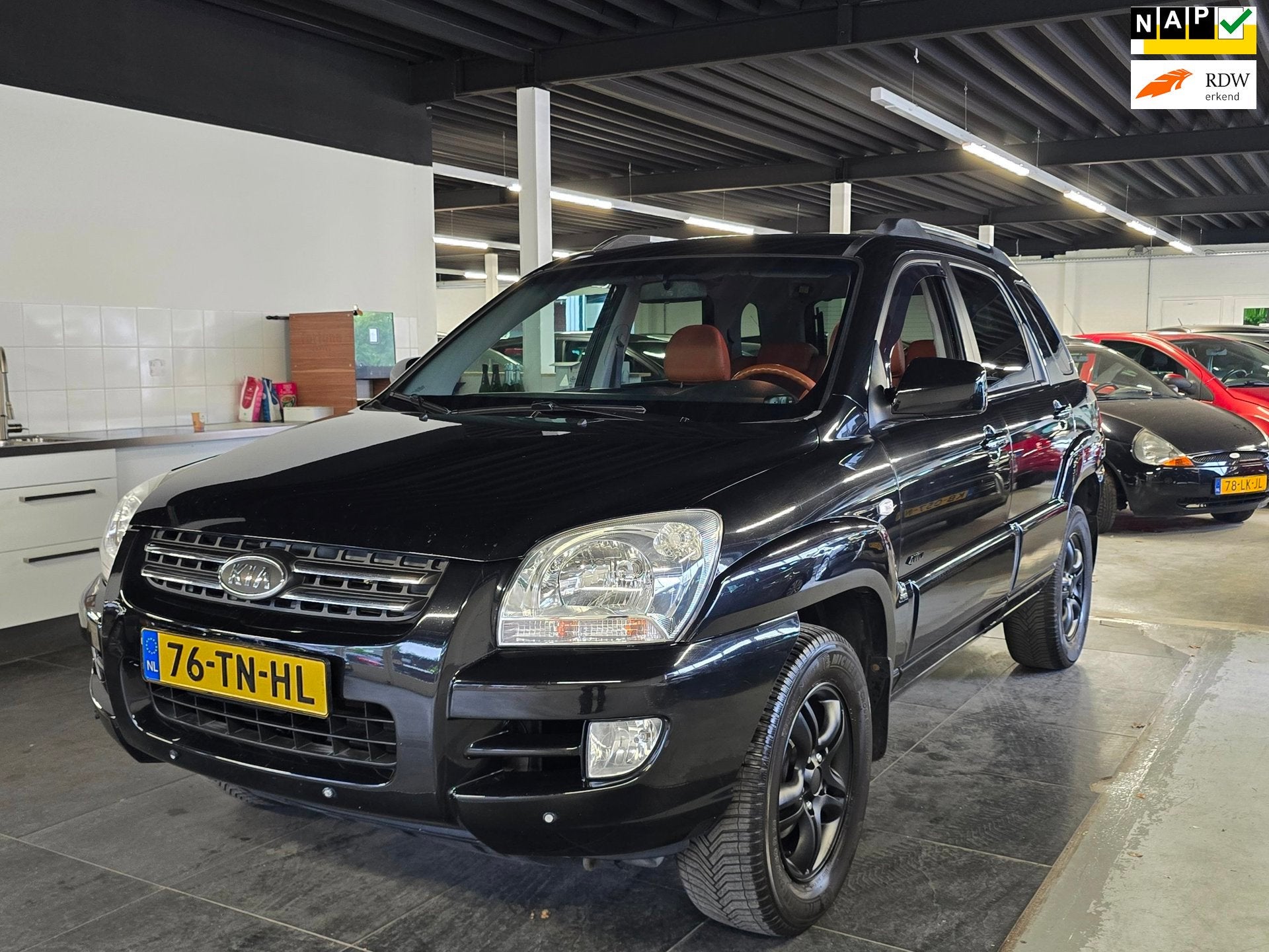 Kia Sportage 2.7 V6 M-bition 4WD/AUTOMAAT/CARPLAY/N.A.P/, Auto's, Automaat, Verwarmde buitenspiegels, Gebruikt, Zwart
