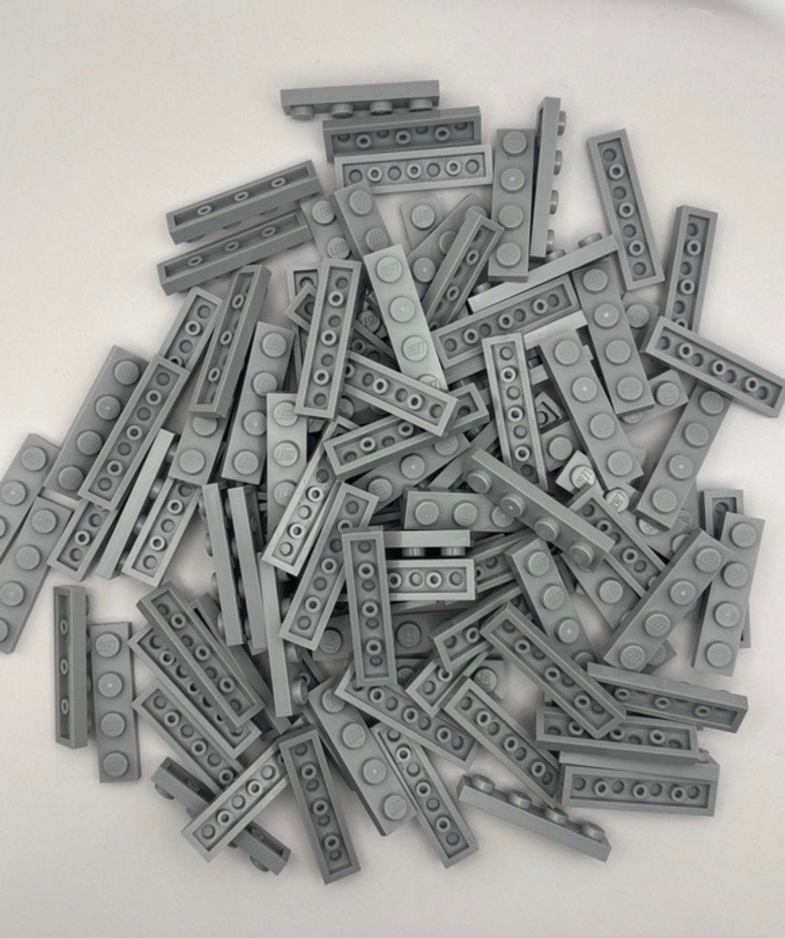 Nieuwe Lego bulk plates 1x4 grijs, 100 stuks, Ophalen of Verzenden, Nieuw, Losse stenen, Lego