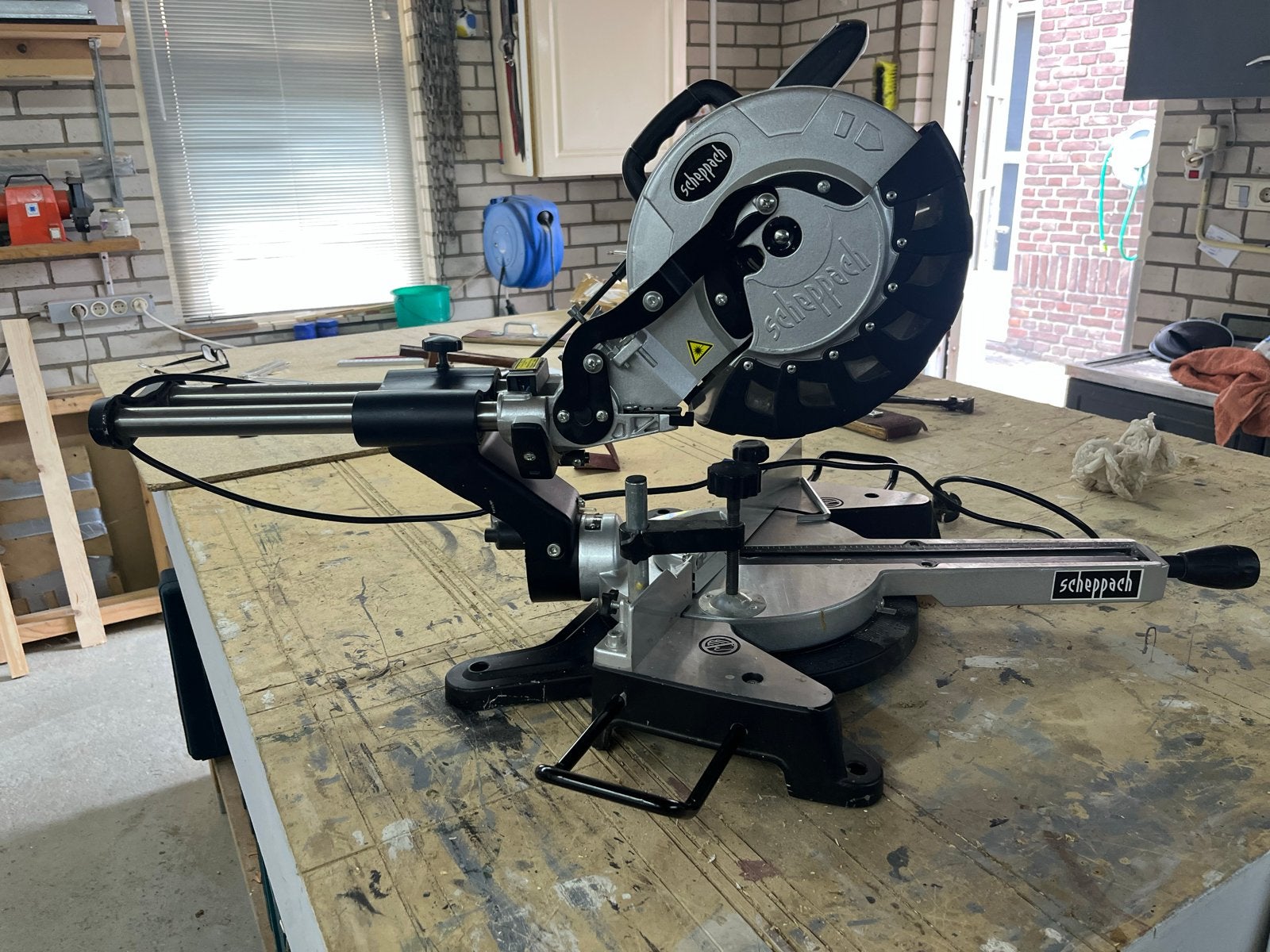 Scheppach HM100LXU Afkortzaag met trekfunctie, Ophalen, 70 mm of meer, Zo goed als nieuw, Afkortzaag