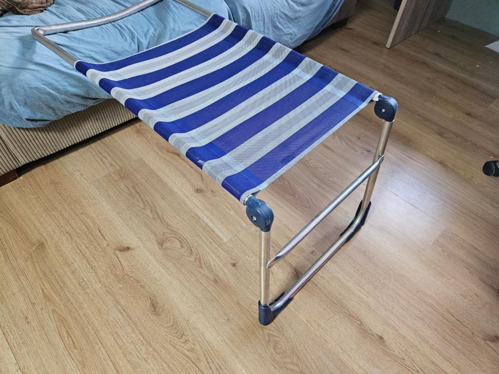 Opvouwbaar voetensteun voor een campingstoel, Ophalen, Gebruikt
