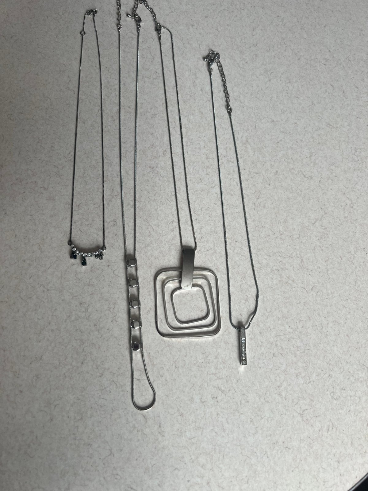 4 kettinkjes 1 prijs, Ophalen of Verzenden, Zo goed als nieuw, Zilver, Overige materialen