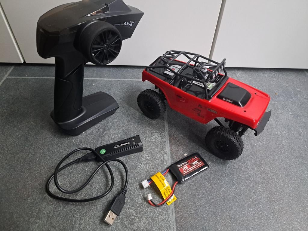 Axial scx24 deadbolt, Hobby en Vrije tijd, Modelbouw | Radiografisch | Auto's, Elektro, Gebruikt, Auto offroad, Ophalen of Verzenden