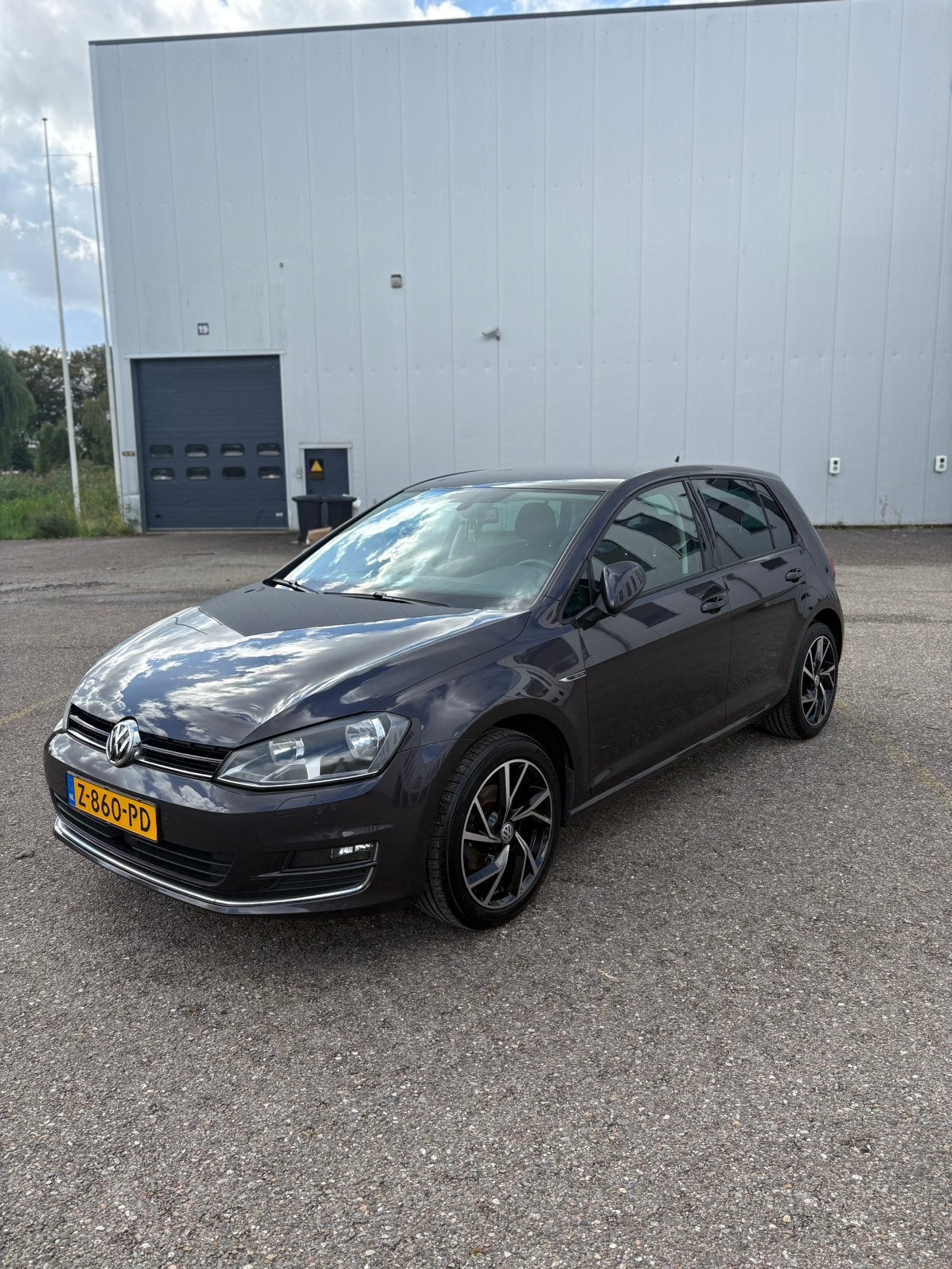 Volkswagen Golf 7 1.2 TSI 2016 Lounge metalic grijs | 140 Pk, Voorwielaandrijving, Dealer onderhouden, Stof, Zwart