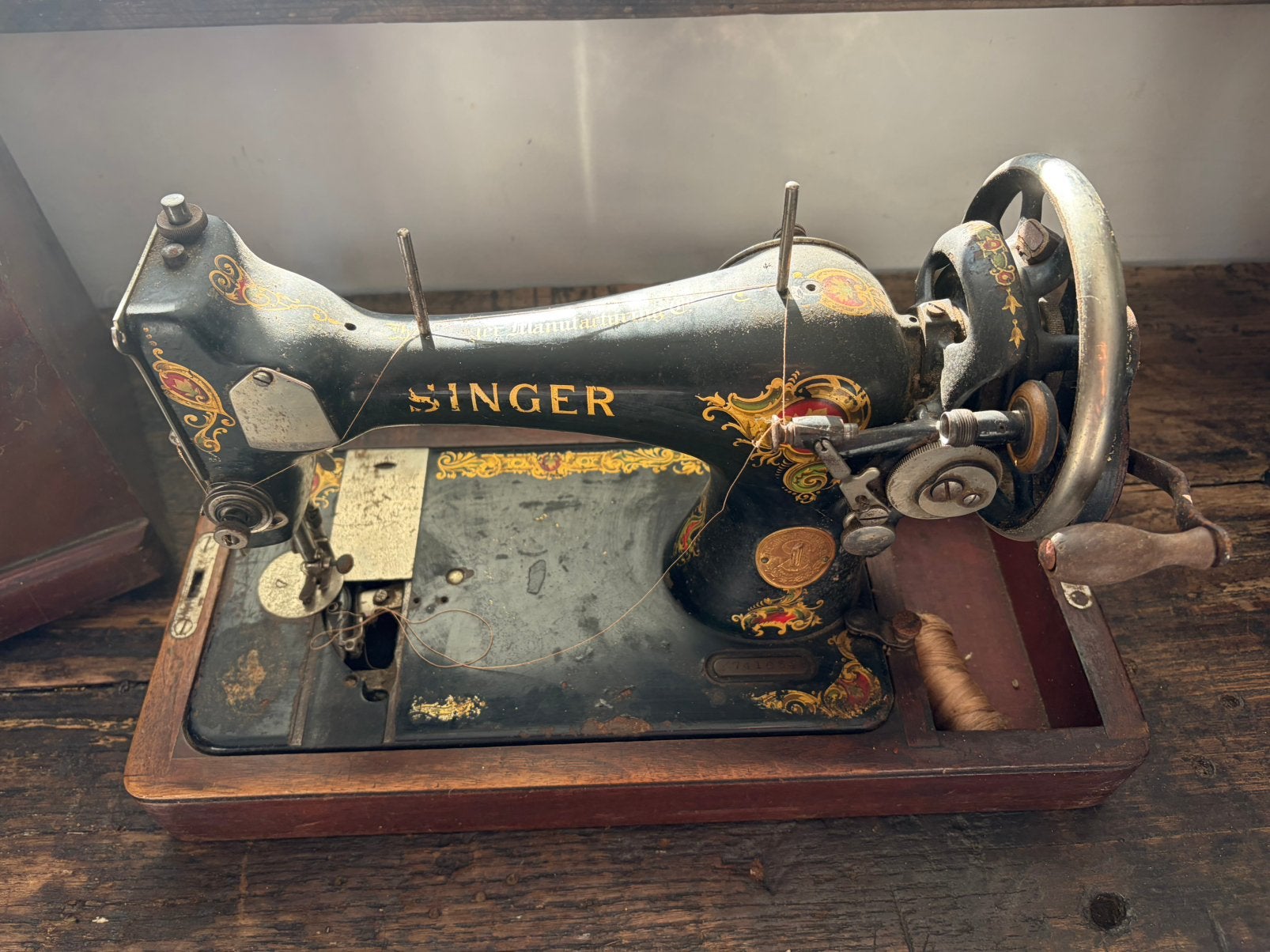 Oude singer naaimachine, Ophalen