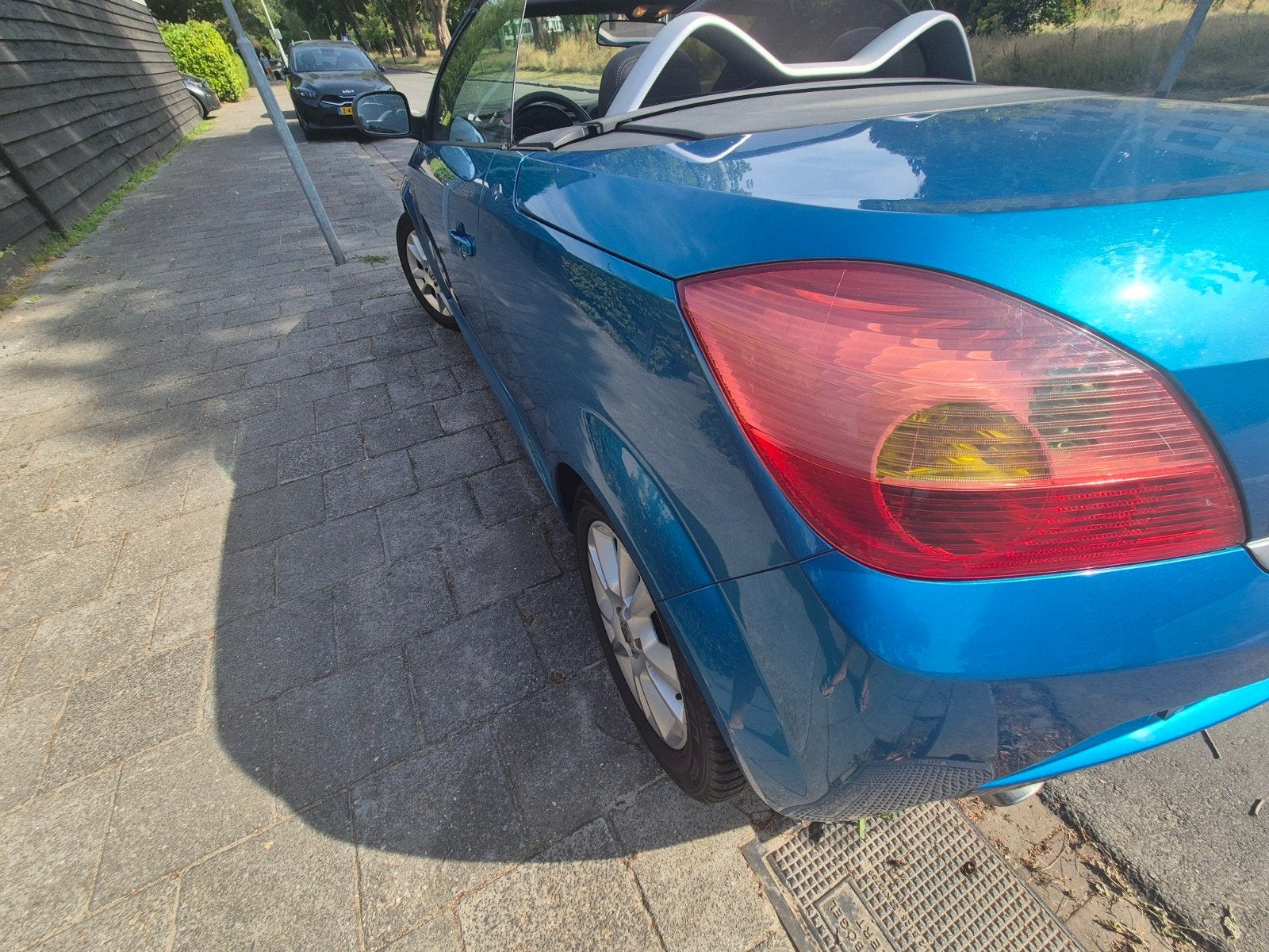 Opel Tigra 1.8 16V Twintop 2005 Blauw, Auto's, Opel, 125 pk, 4 cilinders, Blauw, 1796 cc