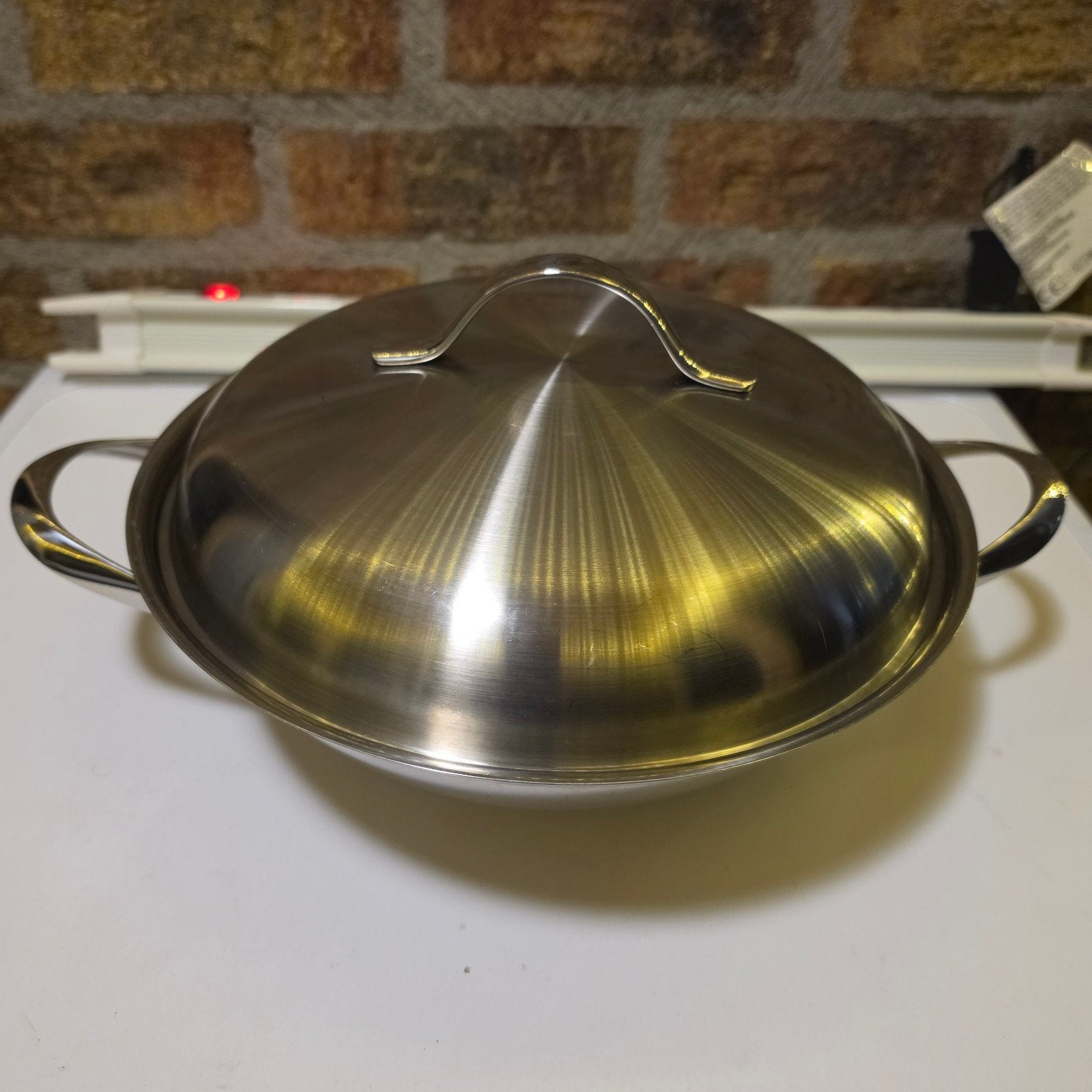 Fissler inductie wokpan profi 28cm, Ophalen of Verzenden, Rvs, Wok